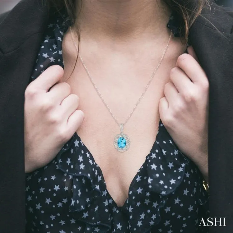 1/10 Ctw Oval Cut 8x6 MM Blue Topaz & Round Cut Diamond Semi Precious Pendant With Chain in 10K White Gold