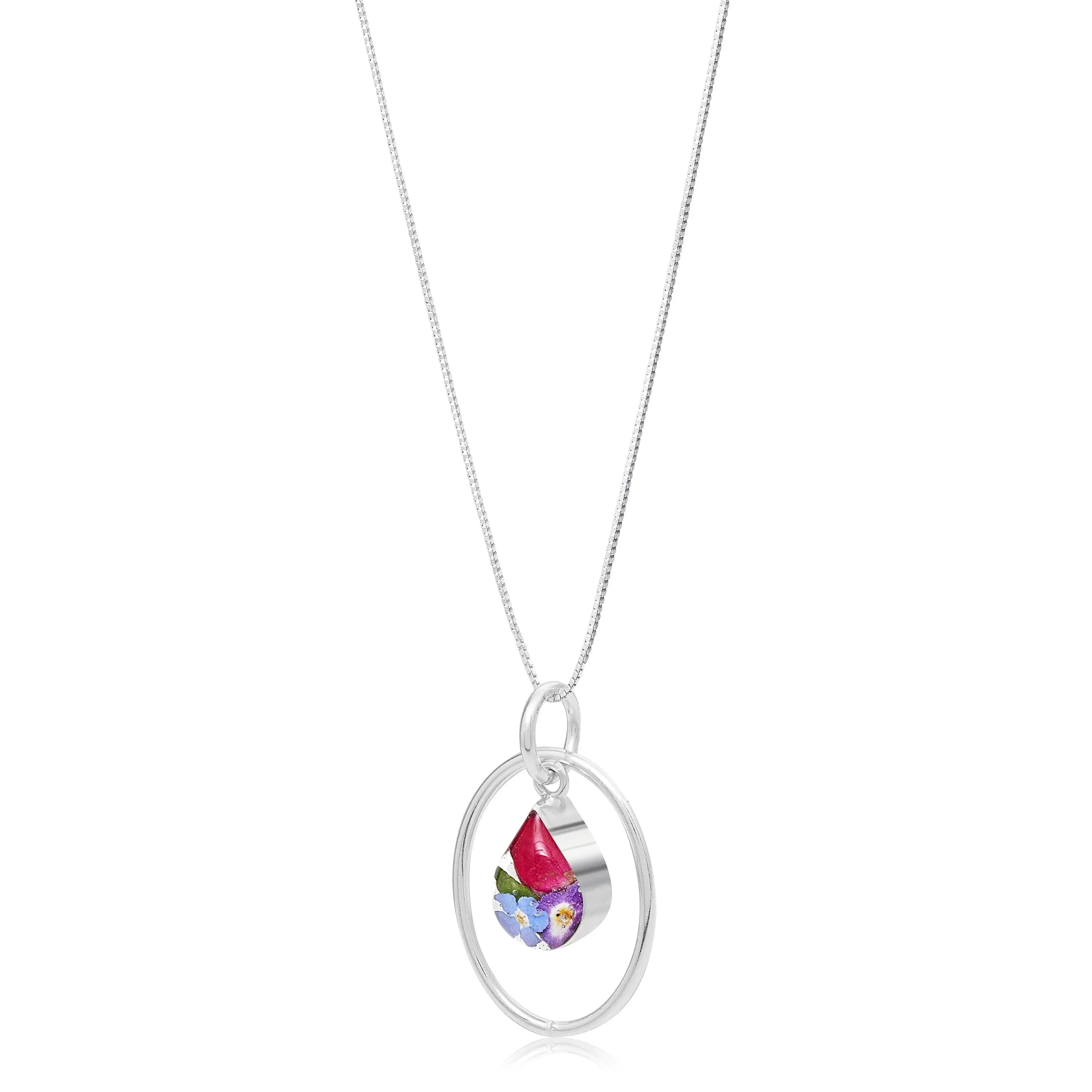 Real flower necklace by  Shrieking Violet® Sterling silver oval pendant with real flowers & silver oval surround. Stylish gift for nature lovers.